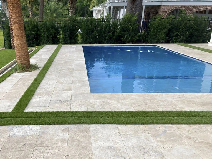 Artificial Turf Installation In The Pool Area In Tampa
